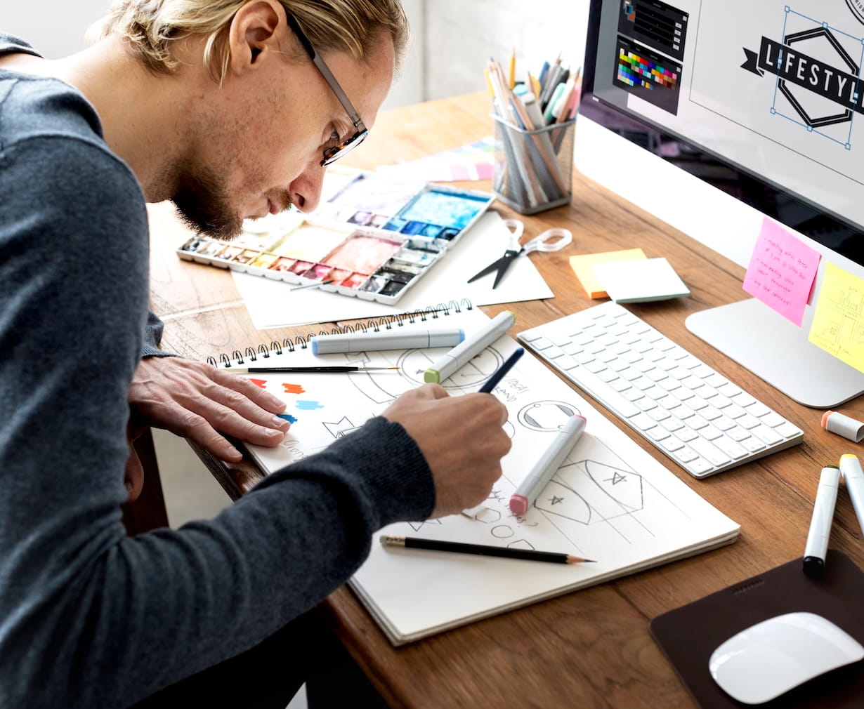 Digital artist designing a logo concept