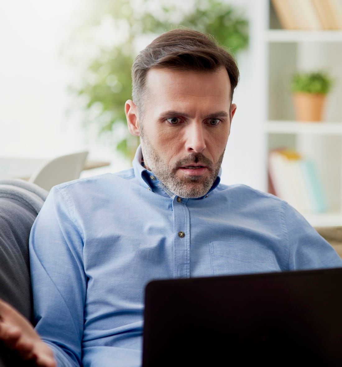 A man reconsiders his online purchase